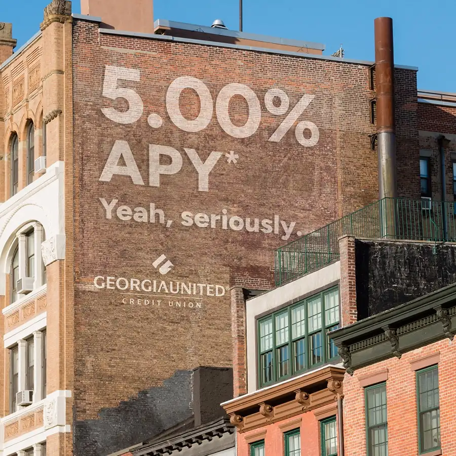 Painted brick mural advertising Georgia United's 5.00% APY certificate of deposit
